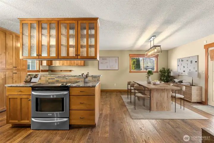 Alder Wood cabinets in the Kitchen.  Virtually staged