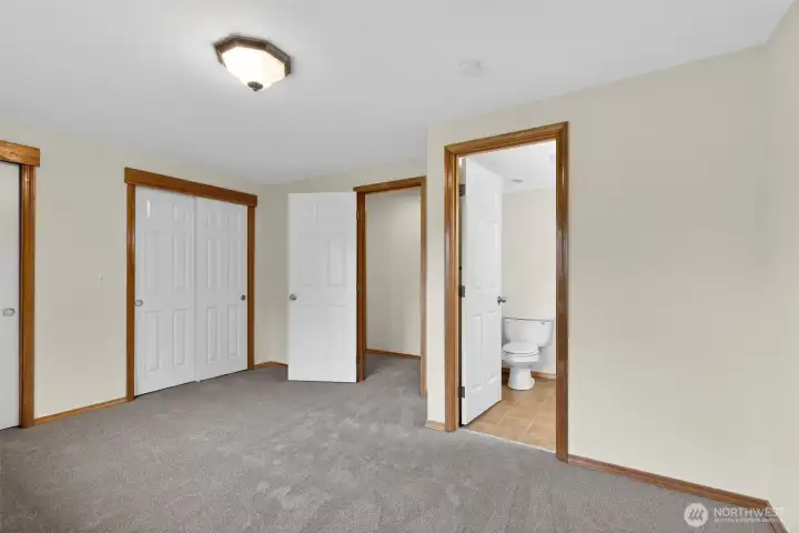 primary bedroom and bath
