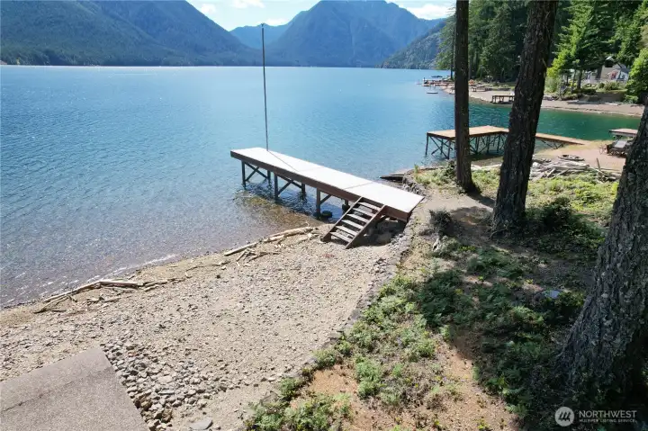Don't miss this rare opportunity to own low-bank waterfront property at gorgeous Lake Cushman!