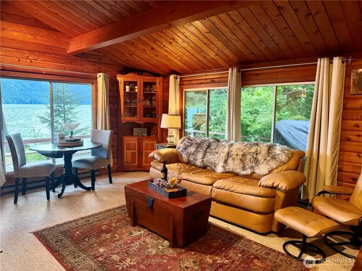 Living room with gorgeous views of the water and mountains.
