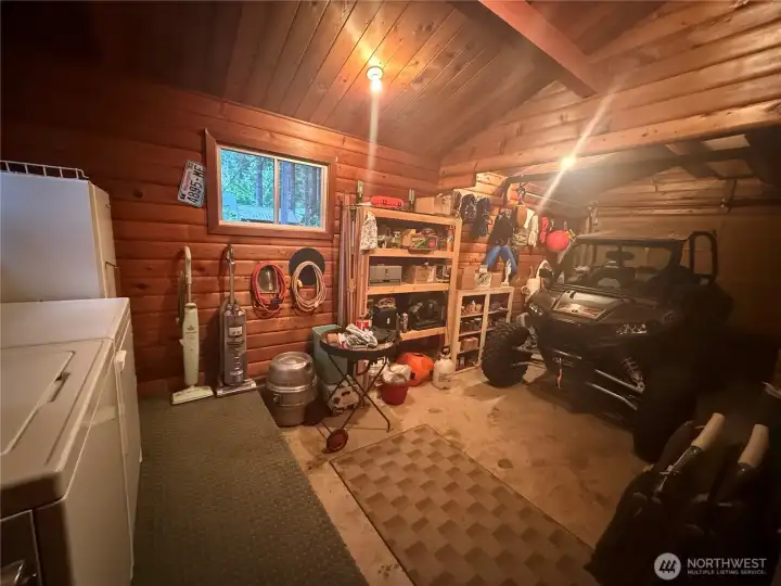 One car garage and utility room in 2nd cabin.