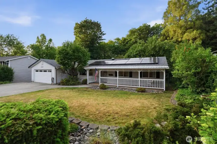 Mature landscaping gives you some front yard privacy.