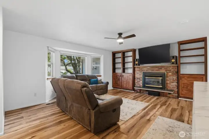 Gas fireplace with built in shelves.