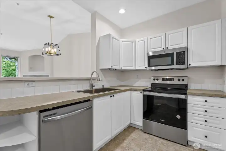 Kitchen with updated appliances and sink Kitchen with updated appliances and sink