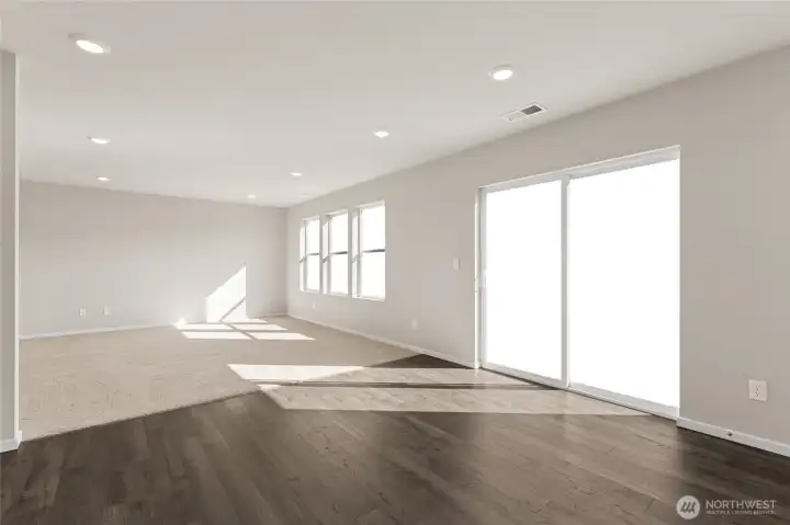 kitchen in to family room,  photos are representative