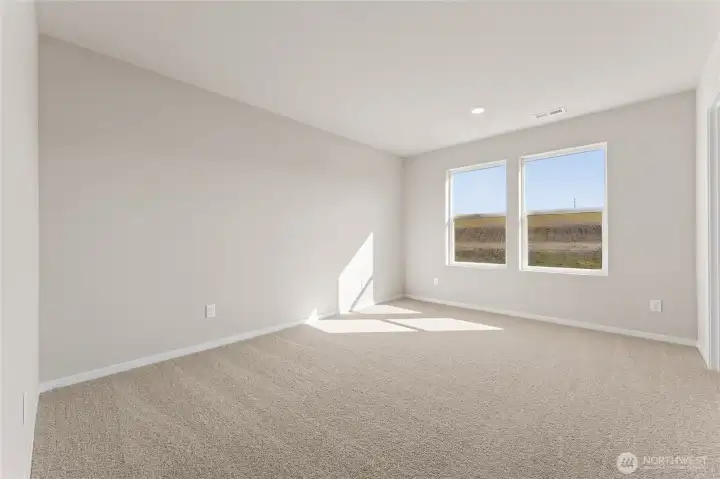 Primary bedroom upstairs.  photos are representative