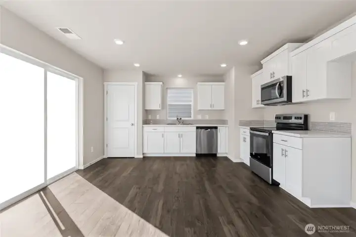 Kitchen with open space for entertaining.  photos are representative