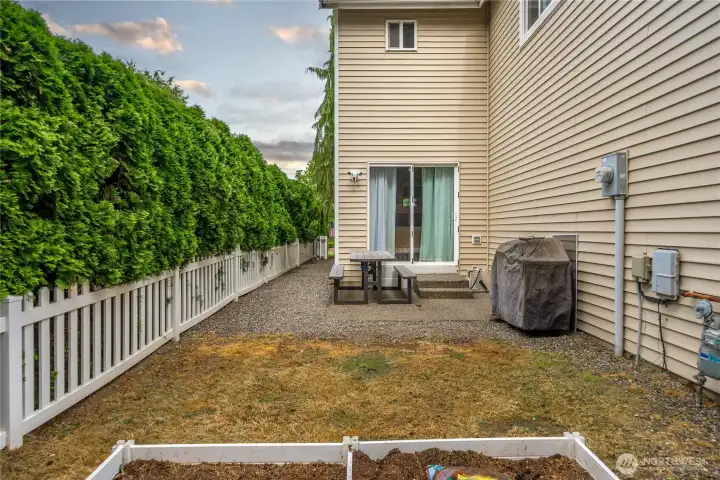 fenced back and side yard