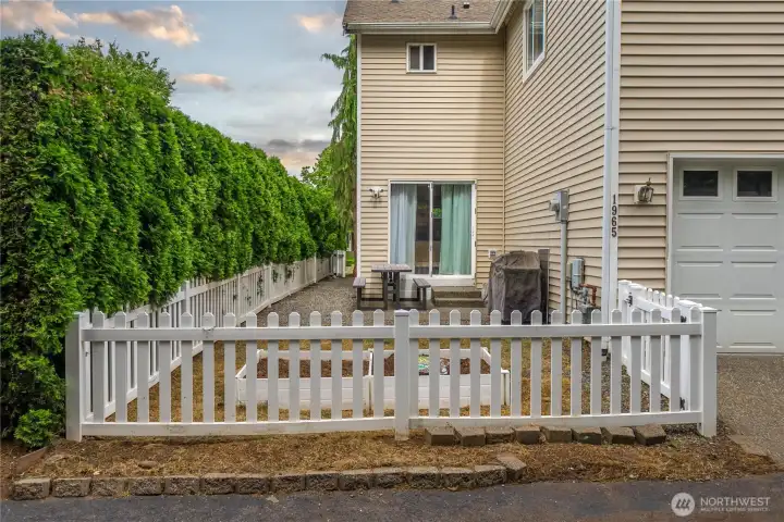fenced back and side yard