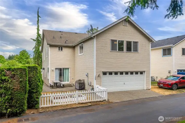 fenced back and side yard