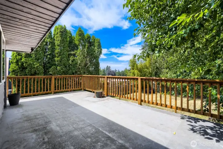 Deck over backyard/patio area. Deck over backyard/patio area.
