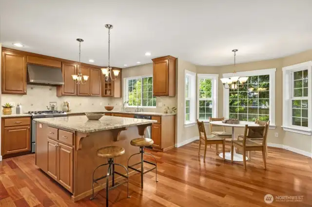 Multiple places to eat in the kitchen, pull up a stool or a chair!