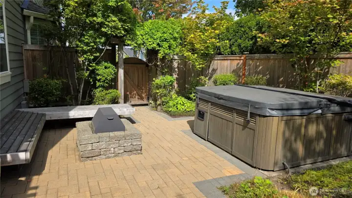 elaxing in the outdoor spa and by the cozy firepit.