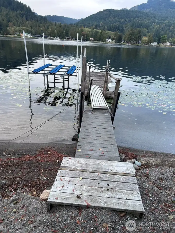 Current dock. There are permit plans in place, close to being approved, with use for 4 property owners with one boat dock each.