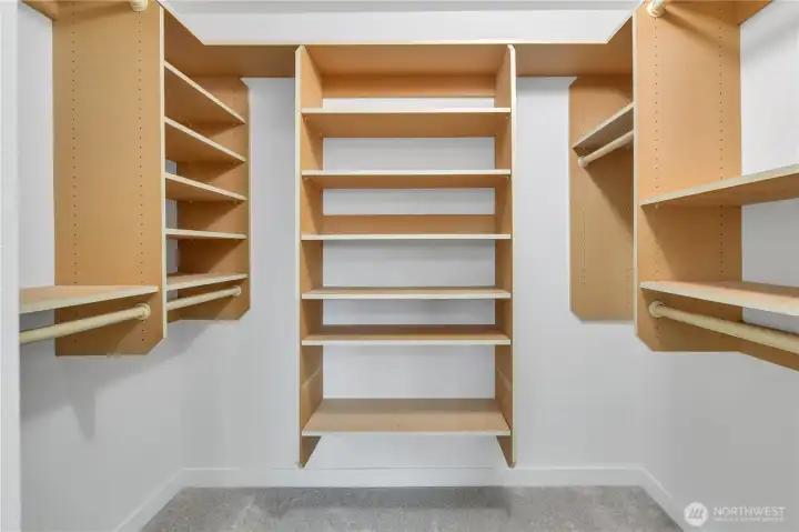 Primary walk-in closet.