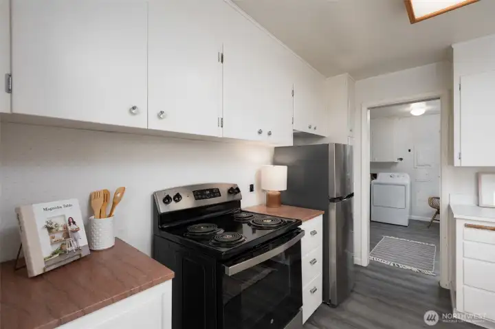 Functional kitchen with newer appliances.