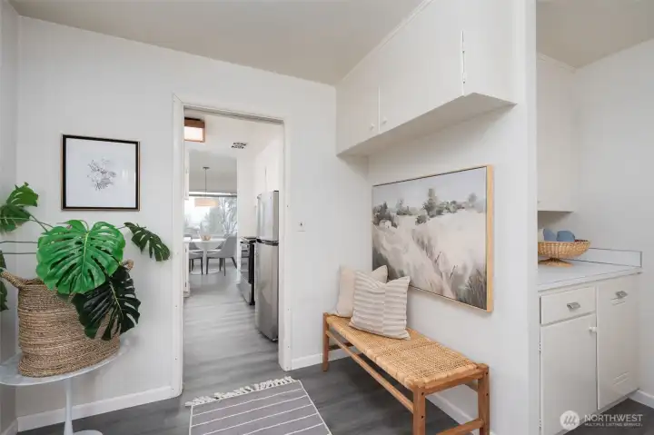 Utility room acts a butler's pantry too with its built ins and side passage to kitchen and hall.