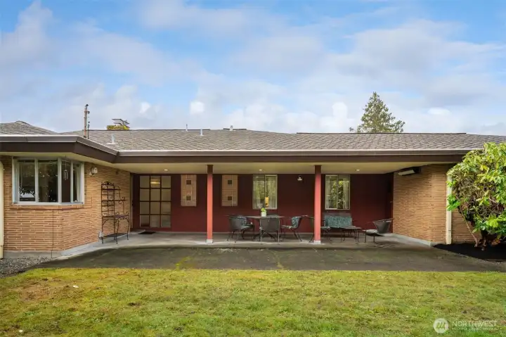 MCM, functional floor plan all the way.  Patio is made for relaxation with lawn, connection to garage and kitchen.