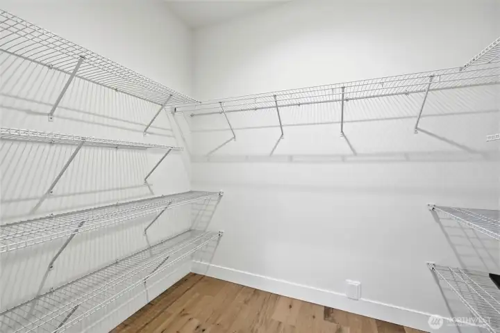 Primary bedroom walk-in closet.