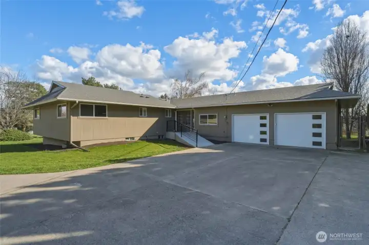 New garage doors, Concrete Path w/New Iron Railing to Entry