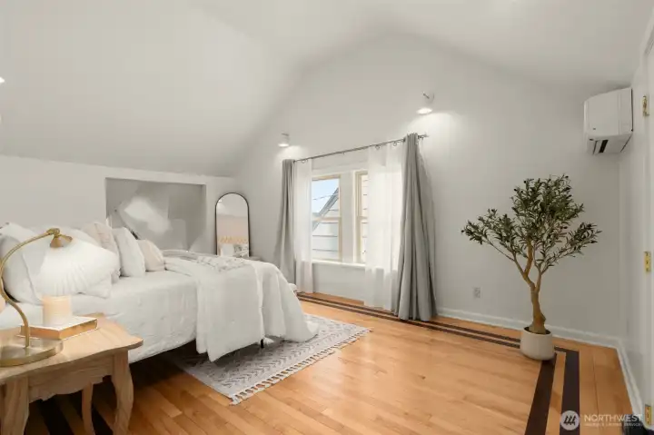 Vaulted ceilings make this space feel open and airy.