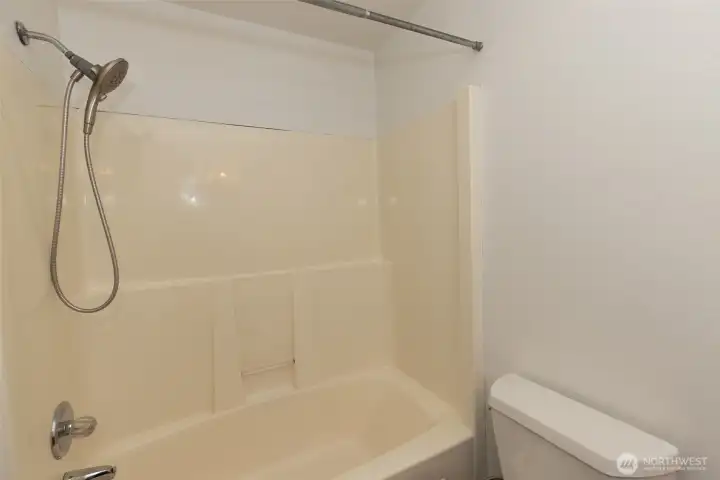 Tub & Shower combo in the full bath in hallway.