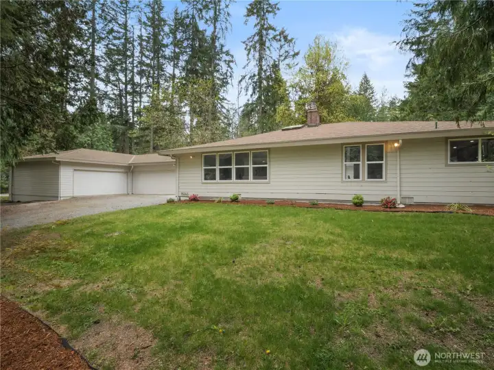 Welcome to your private Mirrormont retreat. Situated on a flat, corner lot, you won't believe what's waiting for you on the inside!