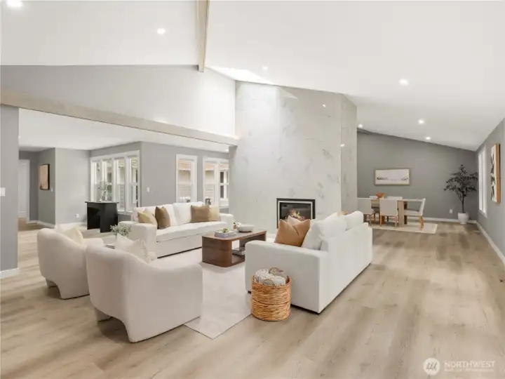 Double-sided luxury tile fireplace warms multiple living spaces.