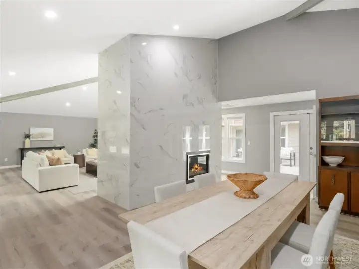 The natural flow between these spaces begs for entertaining and you can just see the French doors which lead to...