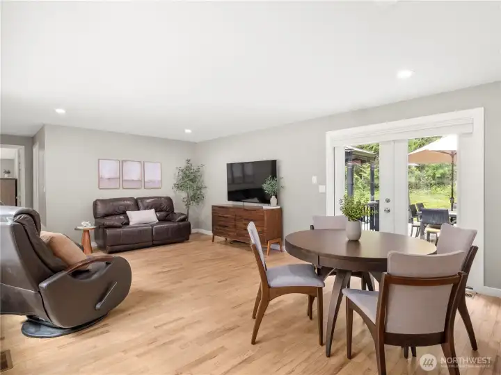 Another view of this warm space and a peak to the backyard!