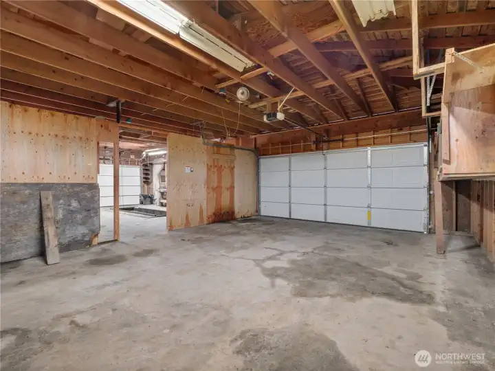 Here, you'll see the main bay, which is double deep and used to have lifts in it. It once held 6 cars plus storage in the back. What would you do here?