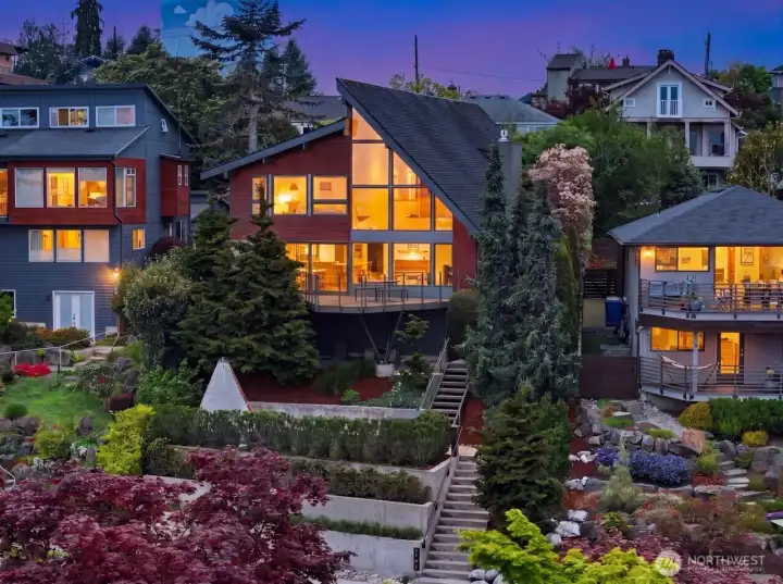 Perched on the coveted east-facing slope of West Seattle, privacy, panoramas & proximity are yours to savor from this contemporary jewel.
