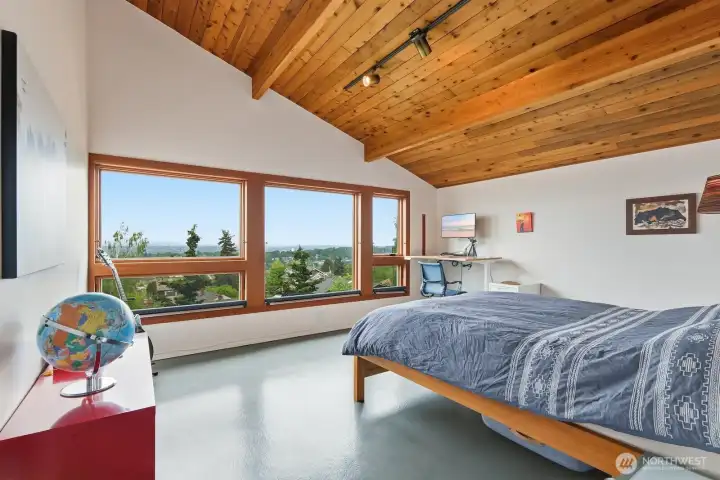 Head upstairs to check out all three bedrooms, including this stately primary suite.