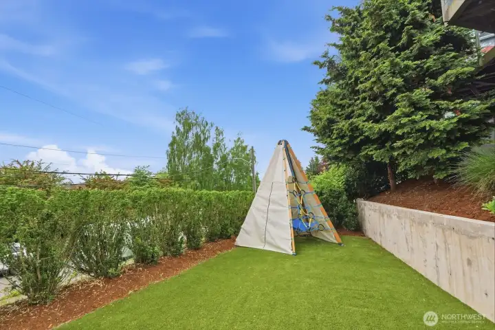 This level front yard space is great for pets or play.