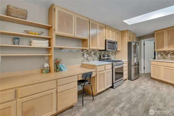 Lots of interesting built-in storage shelves and eating area in the kitchen. Lots of interesting built-in storage shelves and eating area in the kitchen.