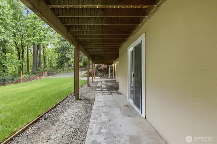 View under the deck. The slider in the foreground is from the lower level extra room. View under the deck. The slider in the foreground is from the lower level extra room.