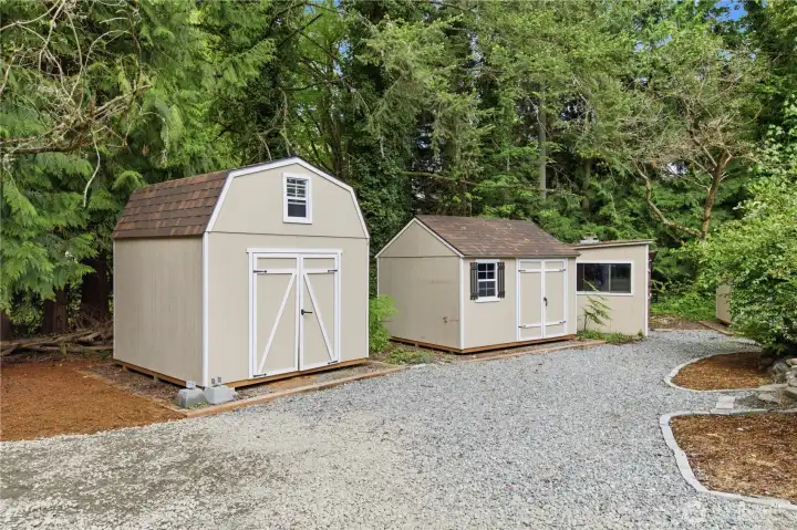 Spacious storage sheds galore! There is also a shop with power. Spacious storage sheds galore! There is also a shop with power.