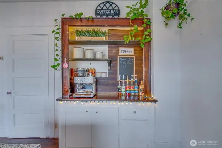 Featuring an original 1918 built in cabinet, beautifully refinished to preserve the home’s historic charm while adding warmth and character to the updated space.