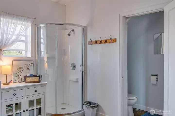 The downstairs shower and half bath add valuable convenience, creating extra flexibility for guests, daily routines, and busy households.