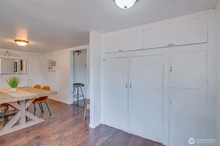 The dining room offers extra storage and a welcoming layout, making it easy to gather, entertain, and keep everyday essentials close by.