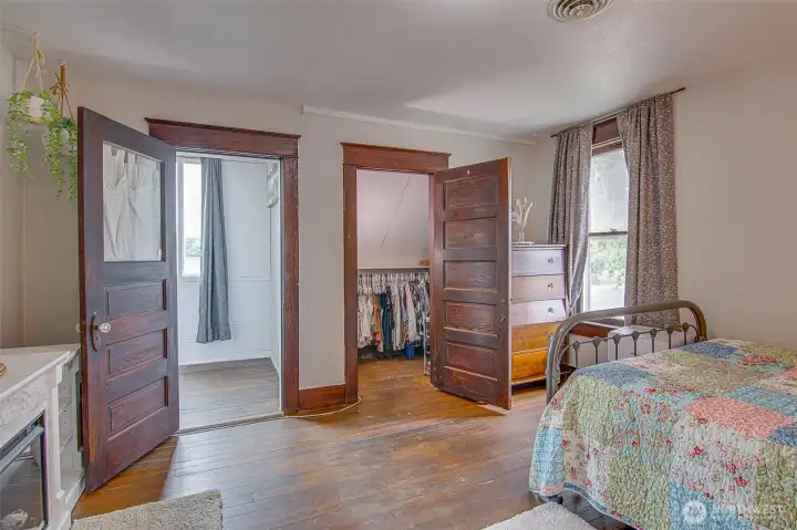 Walk in closet offering convenient shelf storage