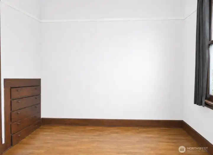 Charming built in dresser adds practical storage and original character to the downstairs bedroom or office