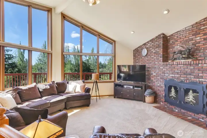 Family room w/ wood burning fireplace