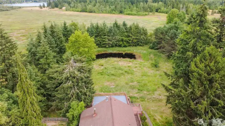 Arial view looking towards the pond at the back of the property Arial view looking towards the pond at the back of the property