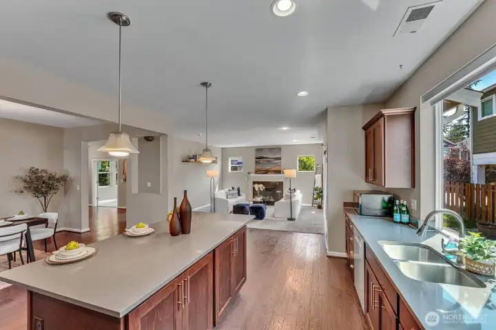 Rich real wood cabinetry and flooring make your main floor very comfortable and welcoming. Rich real wood cabinetry and flooring make your main floor very comfortable and welcoming.