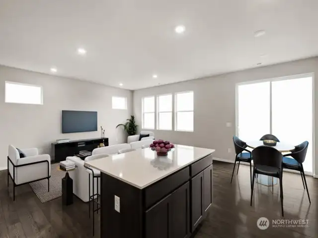 Kitchen Island and Living Room. Photos are for representational purposes only, colors, elevation and features may vary.