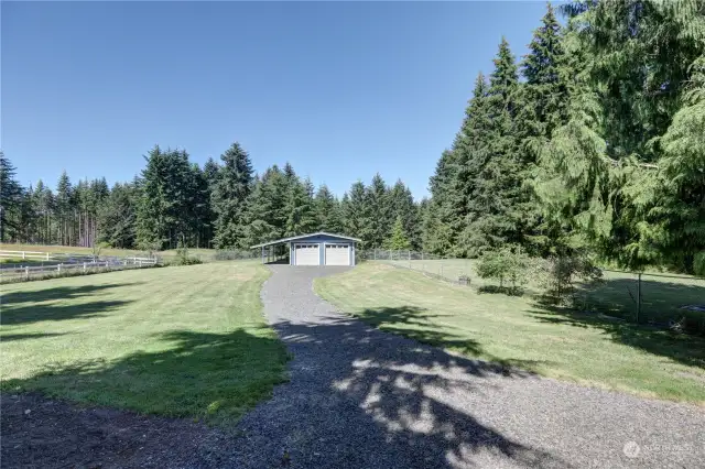 View of back looking at garage area