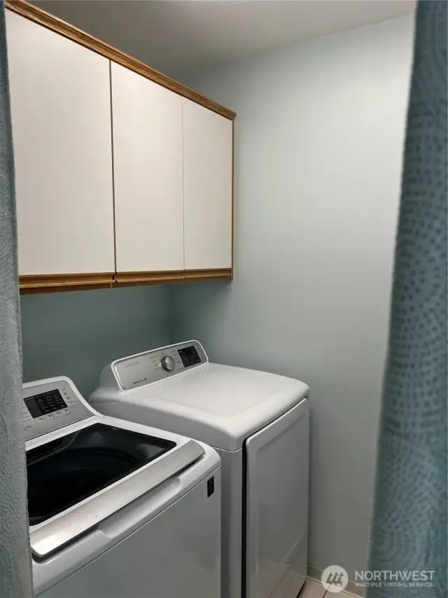 Laundry room conveniently located just outside of the Primary Suite.