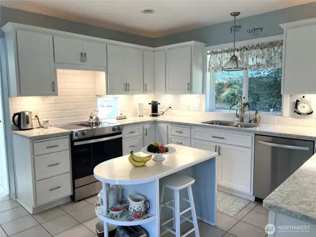 The kitchen is all new with the exception of the tile flooring. The island is removable. All new appliances.