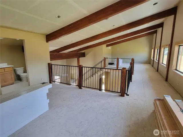 Reverse shot of loft area off upstairs bath taken from Lounge/TV area.